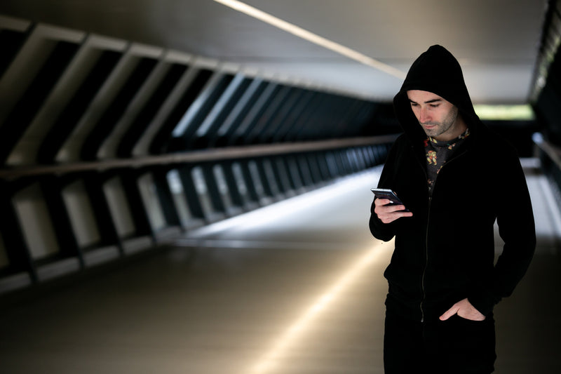 Tom in a casual, reflective portrait moment
